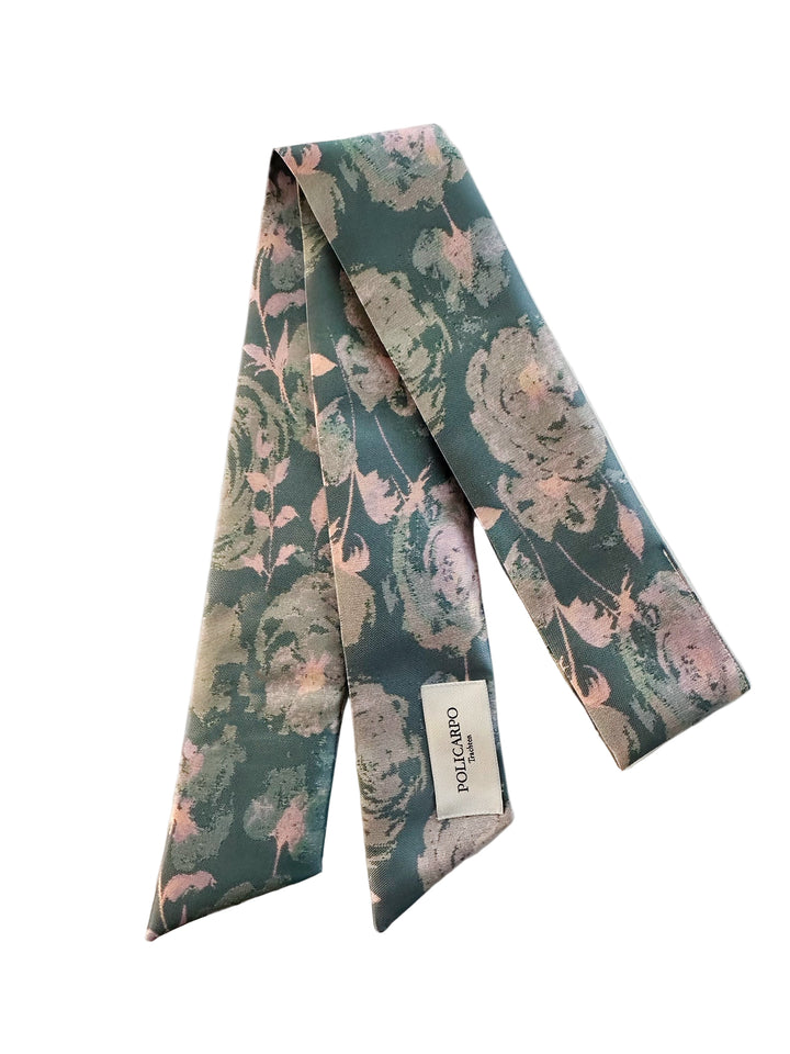 Blaues Twilly mit rosa Blumengewebt als Accessoire für Tasche oder als Gürtel